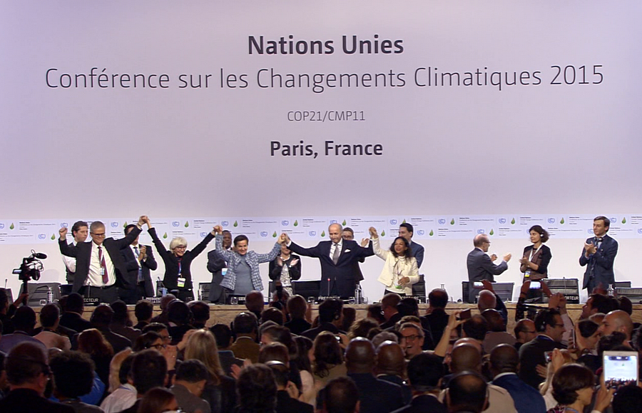 Celebration of the adoption of the text of the Paris Agreement during the Closing Plenary of COP 21 in Paris on 13 December 2015